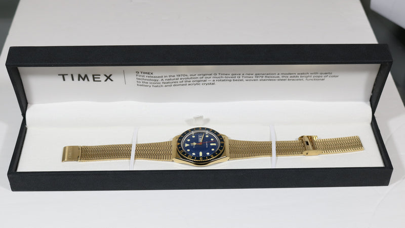 Timex Q Reissue Gold Tone Blue Dial Stainless Steel Day And Date Watch TW2U62000